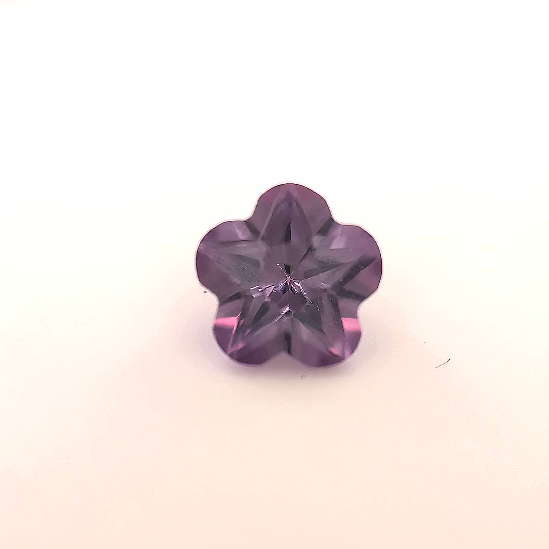 Flower Synthetic Alexandrite (Color Change) Corundum (Warm Light)